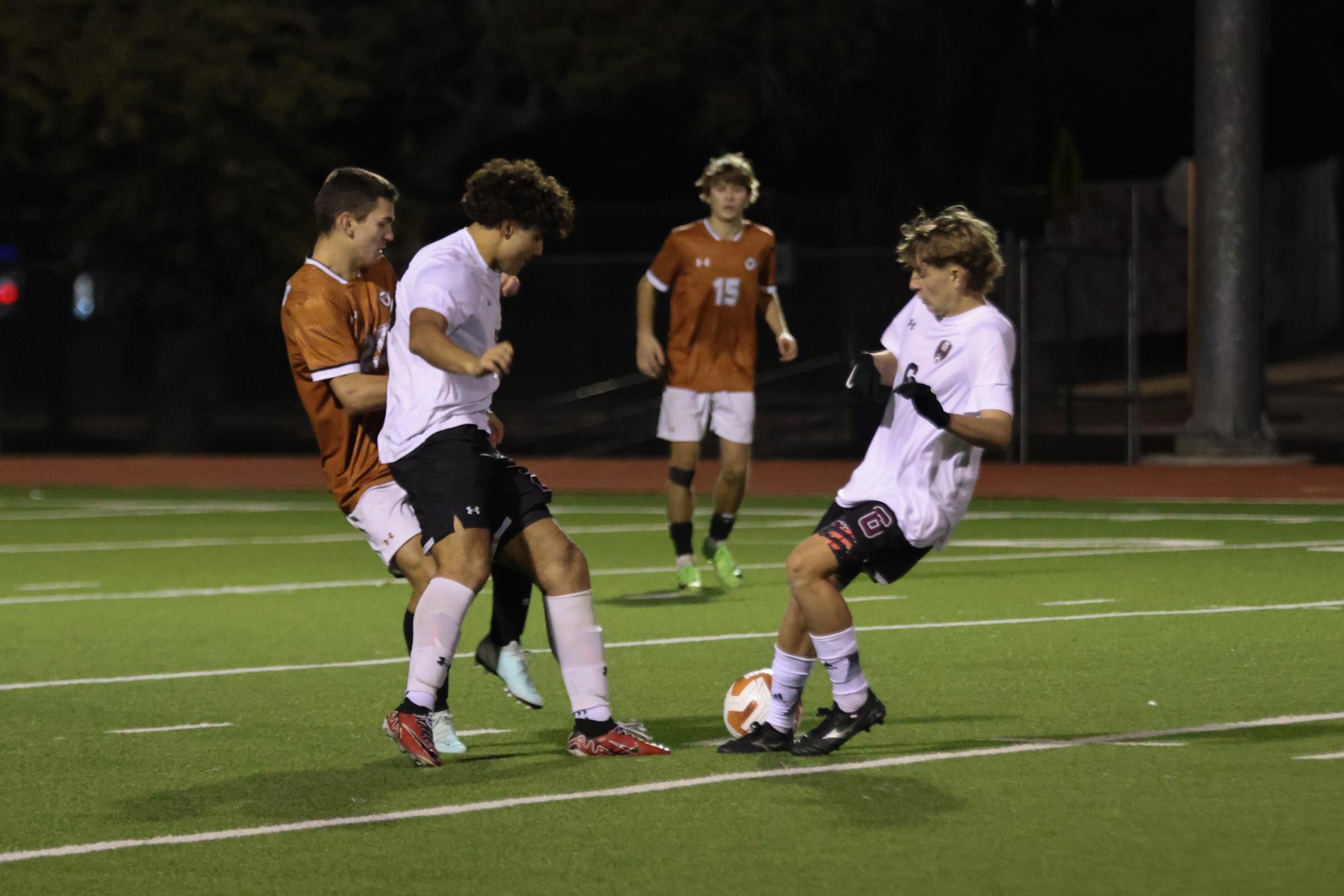 Varsity Boys Soccer Ties Intense Game Against Dragons