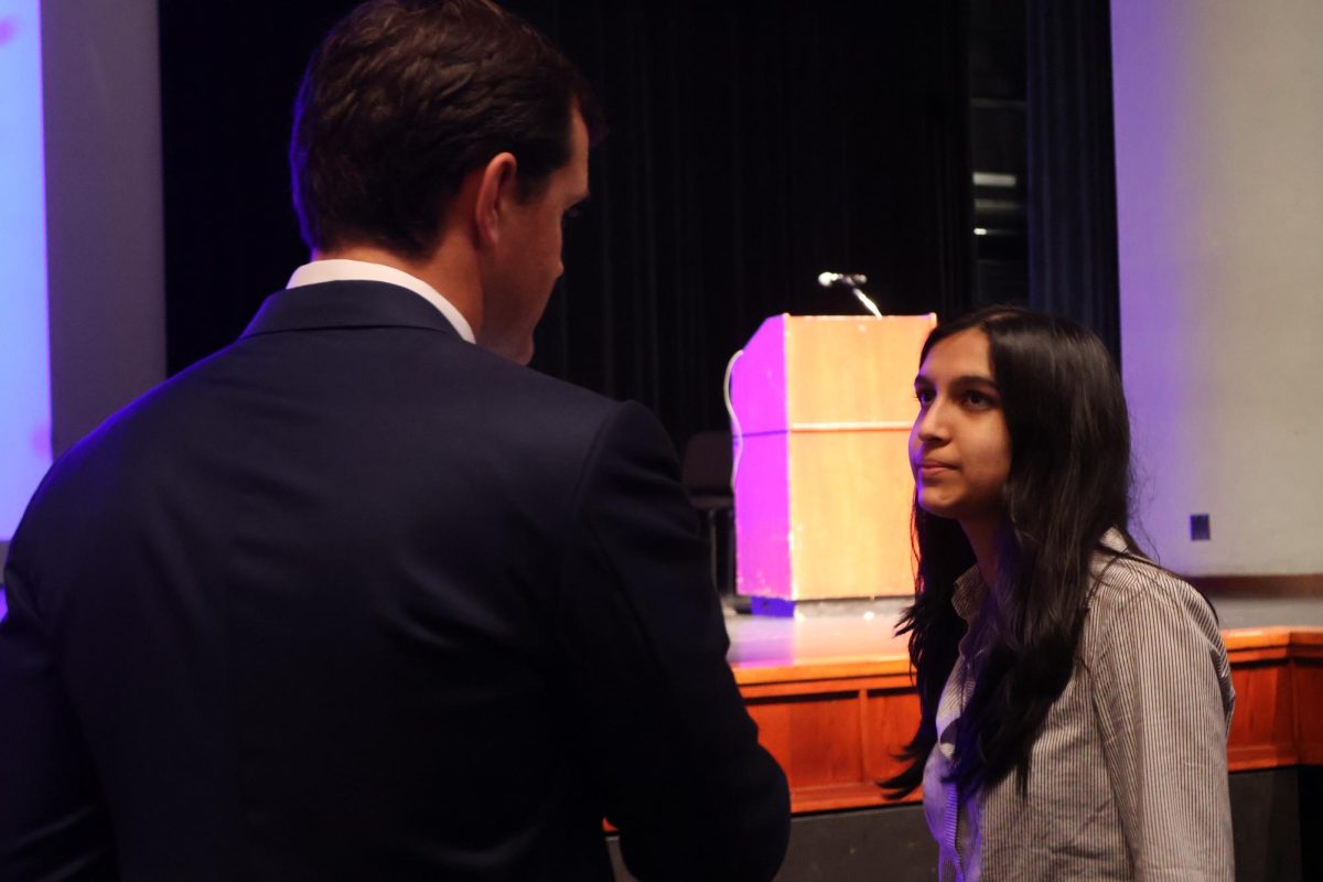 Speaking to an executive from Jefferies, Siyona Jain '25 asks questions regarding the nature of municipal bonds. Jefferies is an independent investment bank that worked with JPMorgan Chase to sell the district's bonds. 