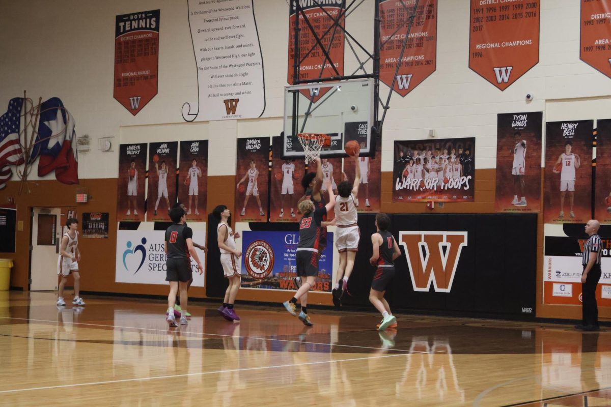 Good Effort, Dylan Jorner '28 strives for a layup.“In this photo I think I got blocked, but I was going up for a layup," Jorner said. He gave it his best efforts to help support his team.