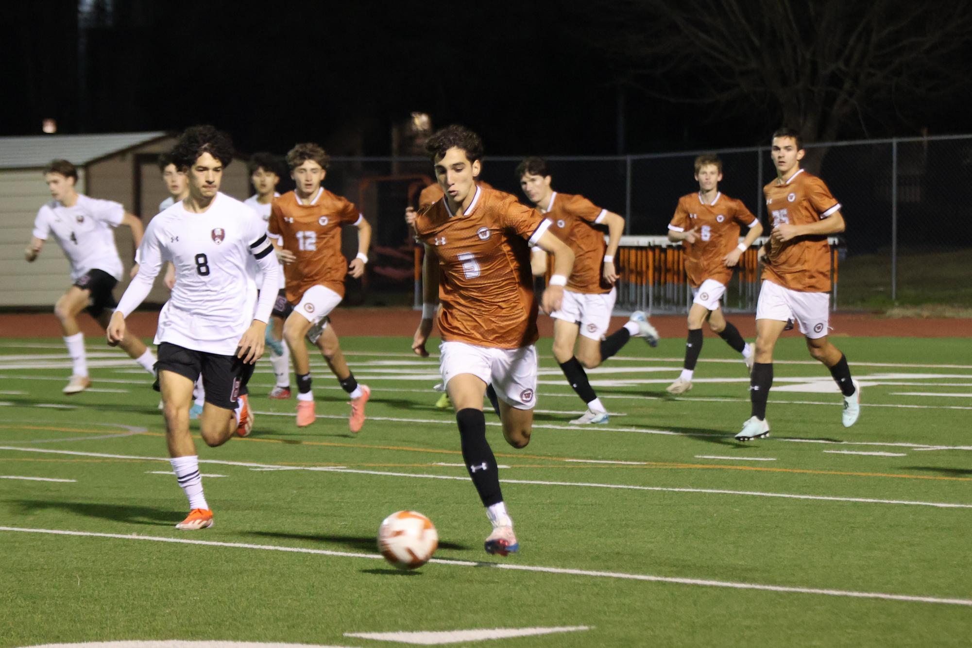 Varsity Boys Soccer Ties Intense Game Against Dragons