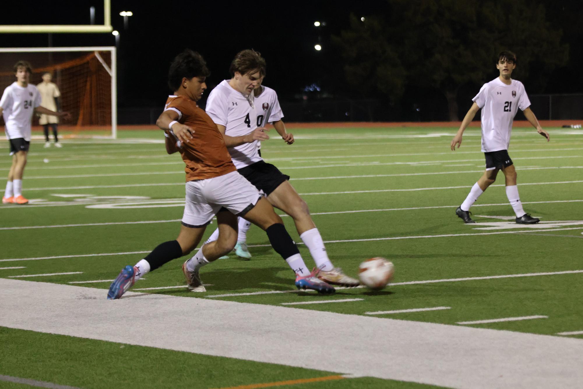 Varsity Boys Soccer Ties Intense Game Against Dragons