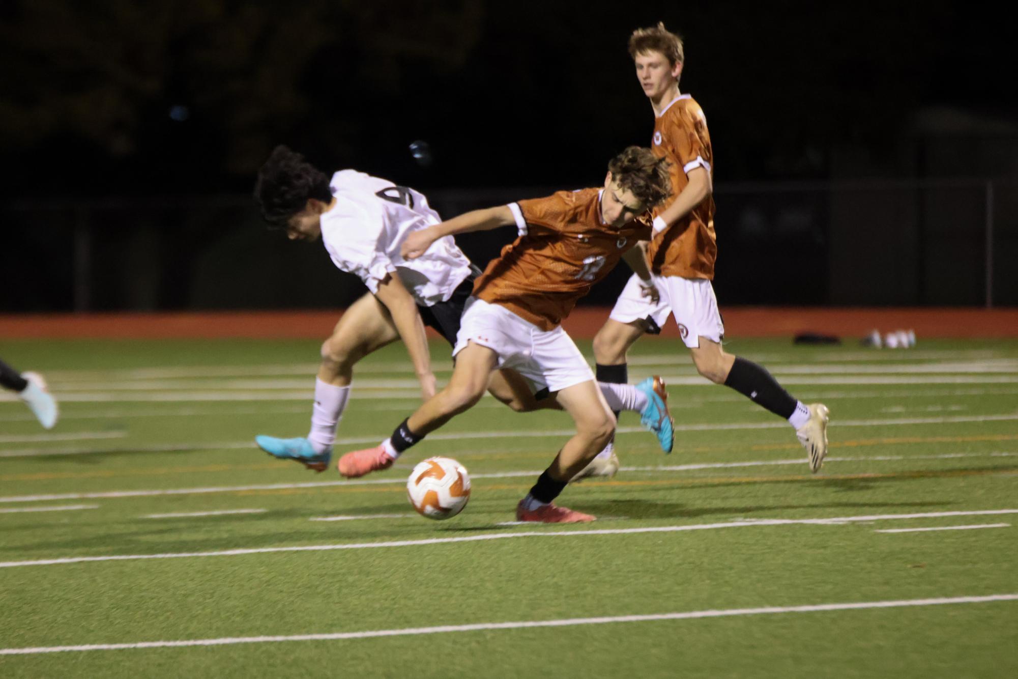 Varsity Boys Soccer Ties Intense Game Against Dragons