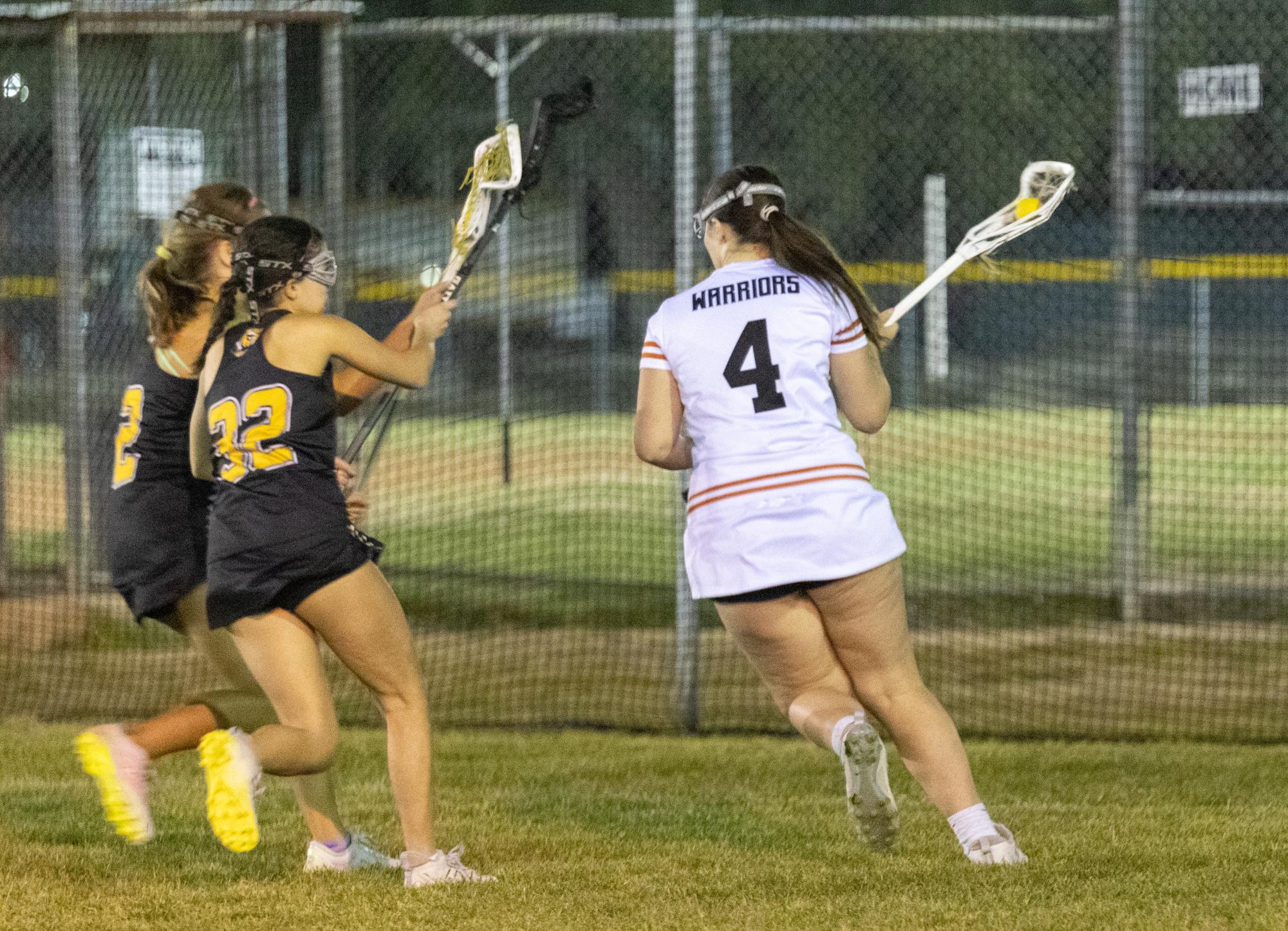 Varsity Girls Lacrosse Narrowly Strikes Down St. Agnes Tigers