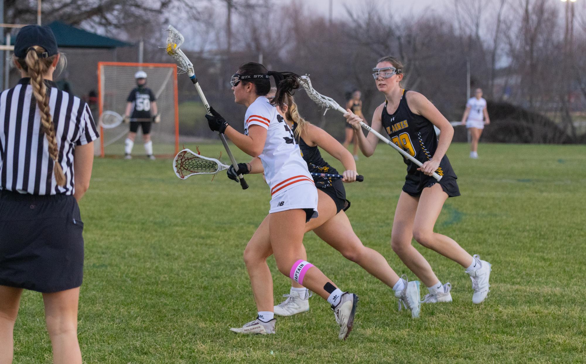 Varsity Girls Lacrosse Narrowly Strikes Down St. Agnes Tigers