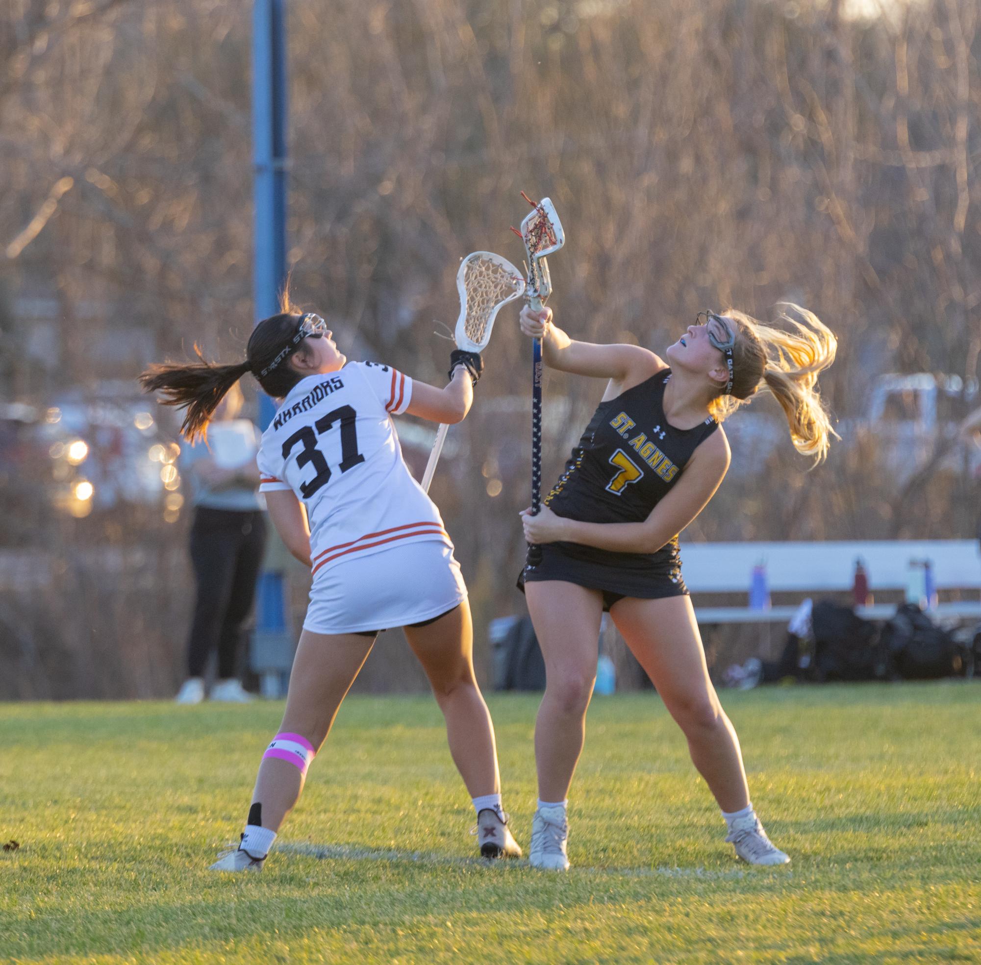 Varsity Girls Lacrosse Narrowly Strikes Down St. Agnes Tigers