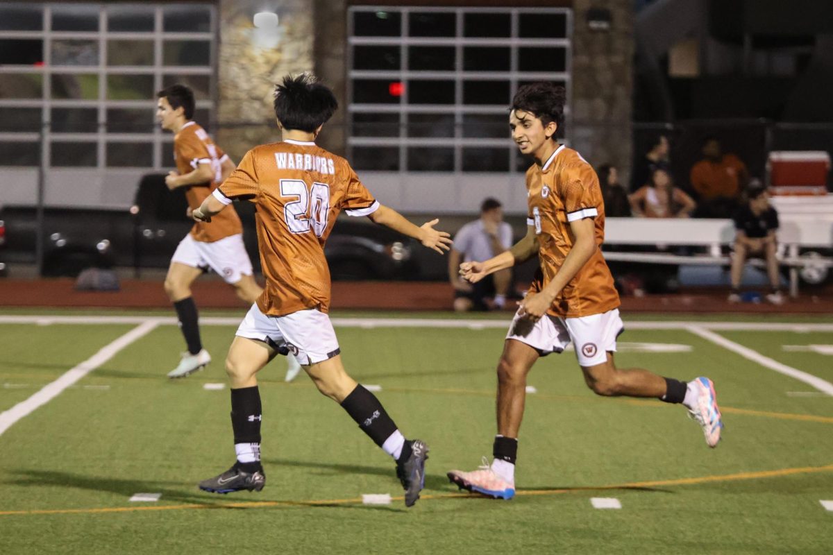 After a half with no goals, Aiden Shen '26 and Ishaan Saini '26 celebrate their first point of the night as they run down the field. The goal was scored by Shen.