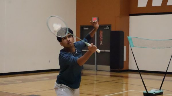 Concentrated on returning a powerful serve, Chethan Karthik '27 locks on to the incoming projectile and successfully returns to begin a rally. Though Karthik went on the lose this point, the game remained close. 