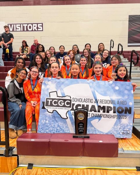 Coming home with a first place trophy and banner, the JV Winter Guard ended their season as Scholastic JV Regional A Champions at TCGC Davenport.