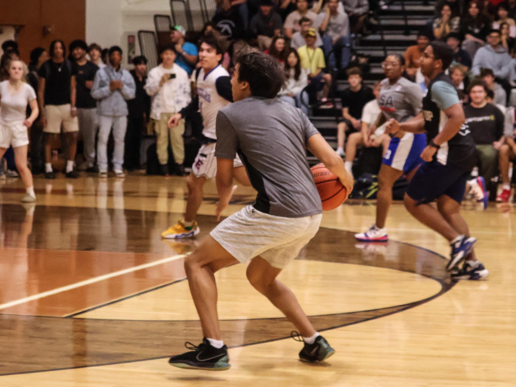 Staff Dominates in Annual Student Versus Staff Basketball Game