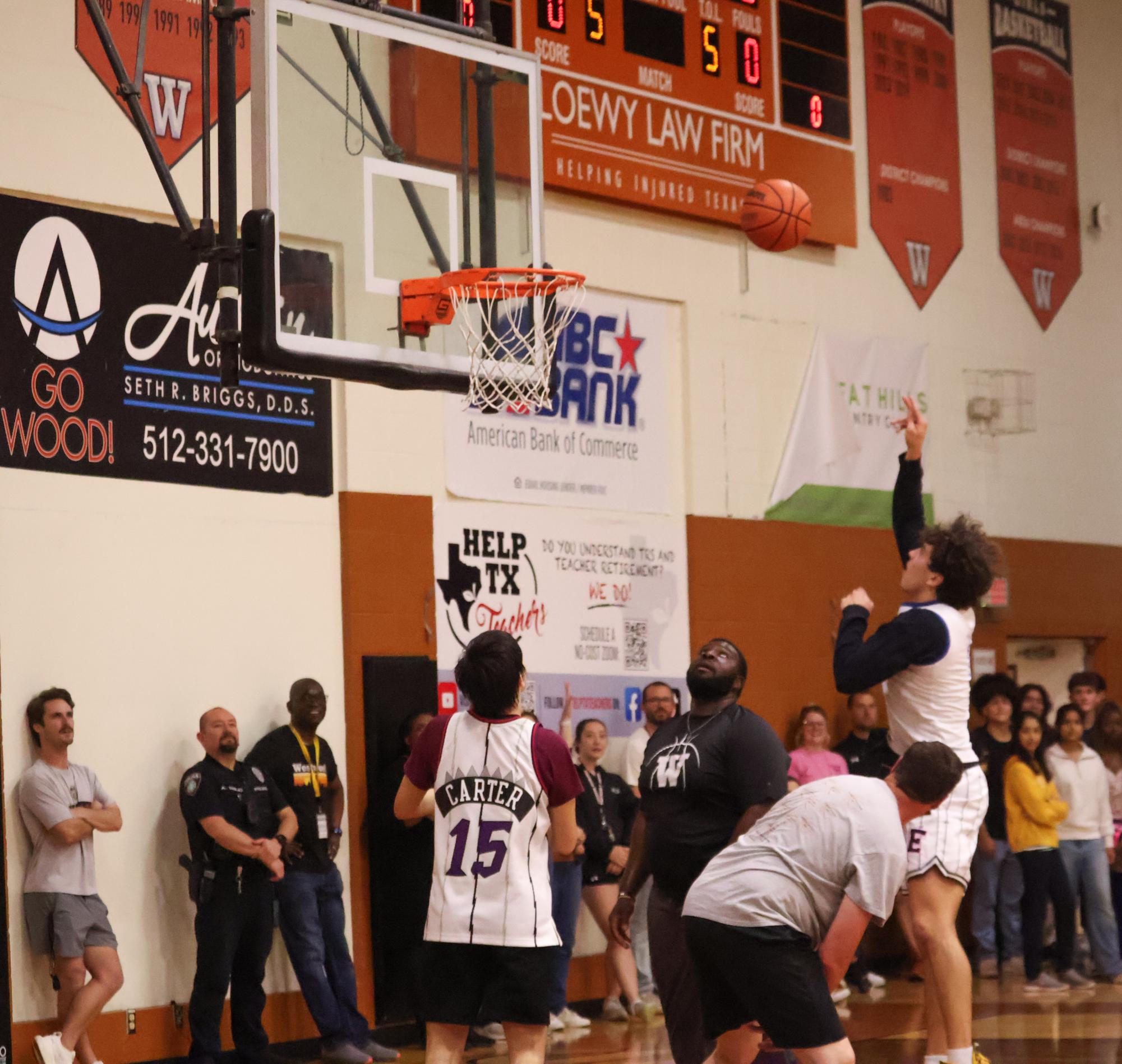 Staff Dominates in Annual Student Versus Staff Basketball Game