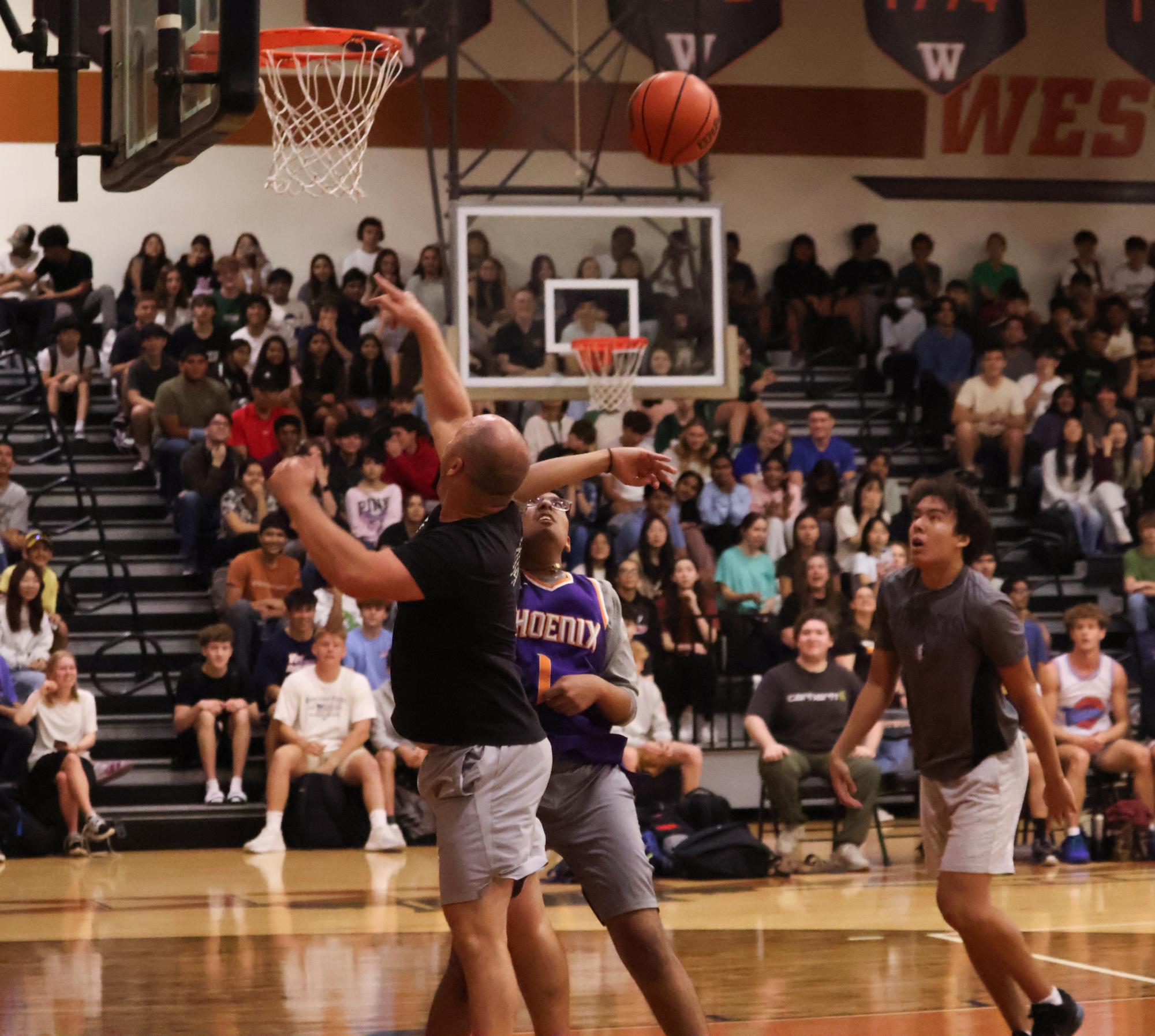 Staff Dominates in Annual Student Versus Staff Basketball Game