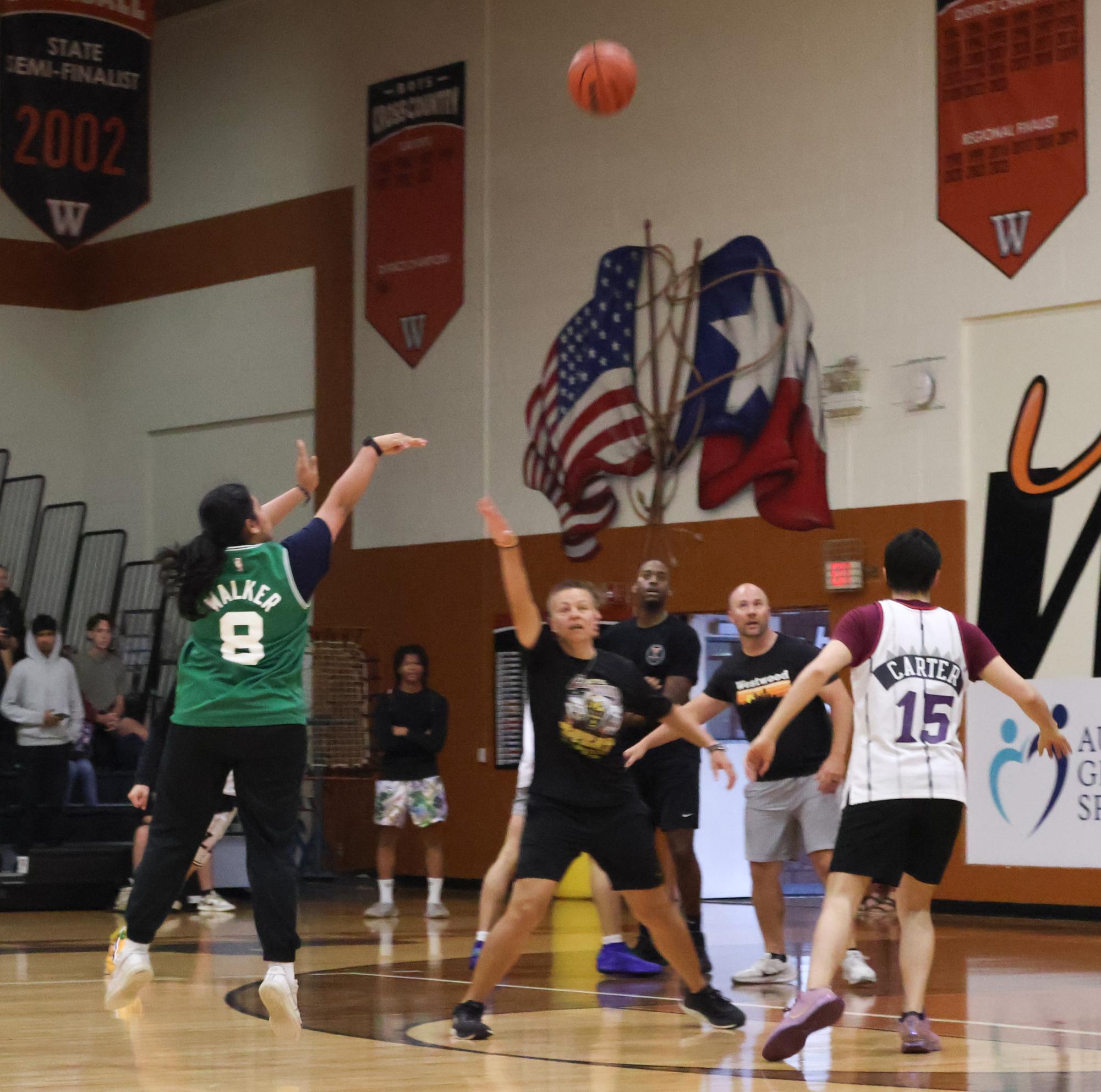 Staff Dominates in Annual Student Versus Staff Basketball Game