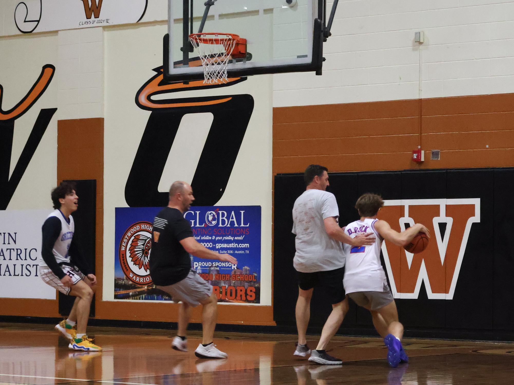 Staff Dominates in Annual Student Versus Staff Basketball Game