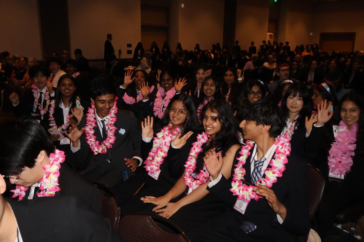 Geared up with pink spirit wear, HOSA members cheer for Texas Area 1. With the official area color of the year, pink, members were encouraged to show their HOSA spirit.