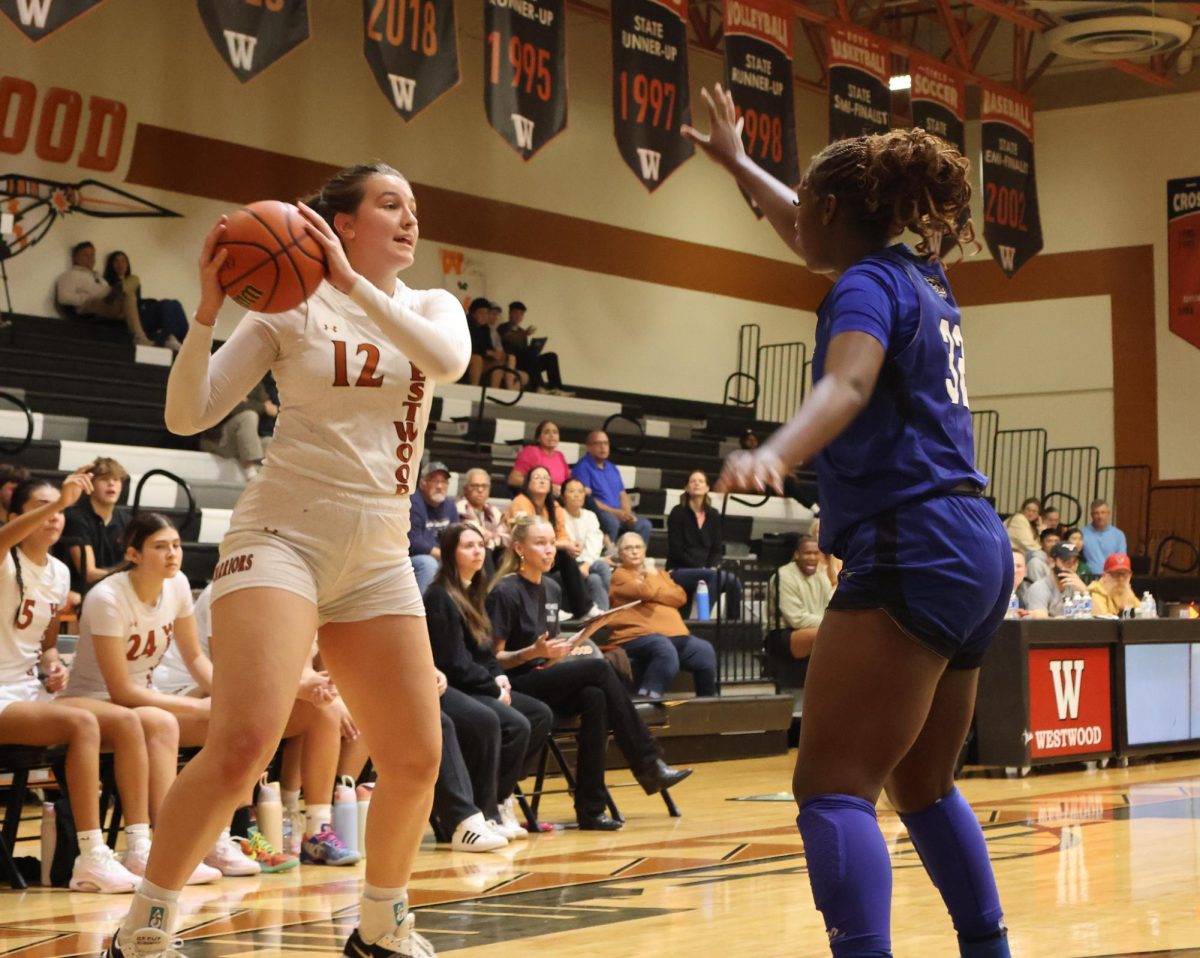 Vivian Hapka '26 communicate across the court towards her teammates to make a pass. Hapka defense was crucial to win.  
