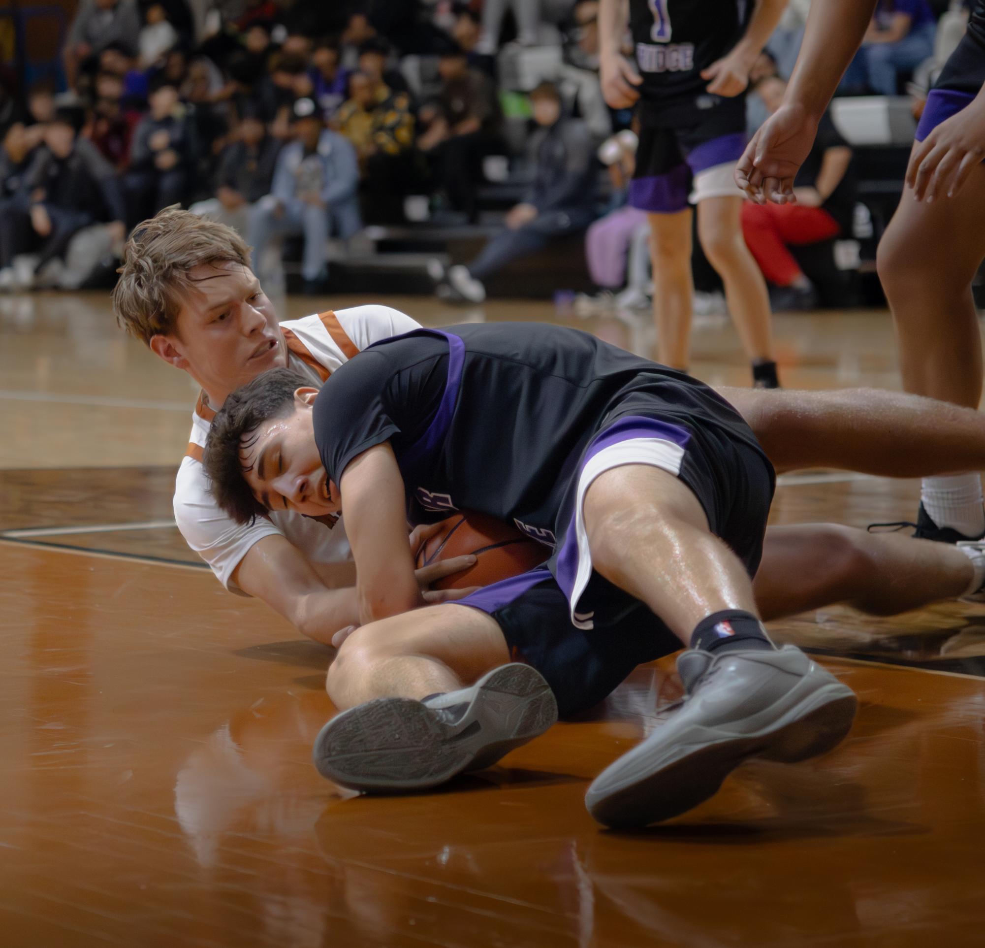 Varsity Boys Basketball Swoop Past the Raiders Winning 67-46