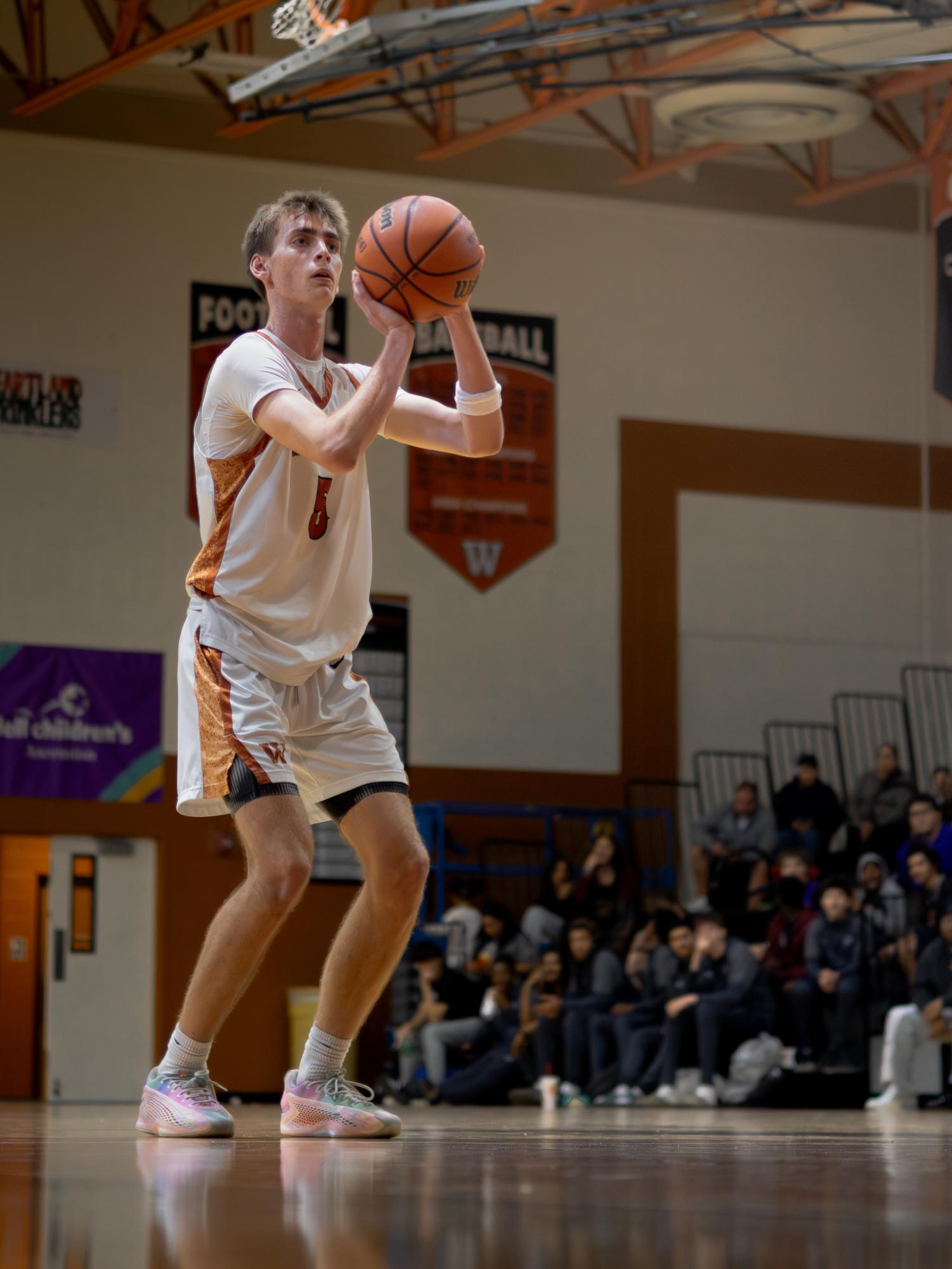 Varsity Boys Basketball Swoop Past the Raiders Winning 67-46