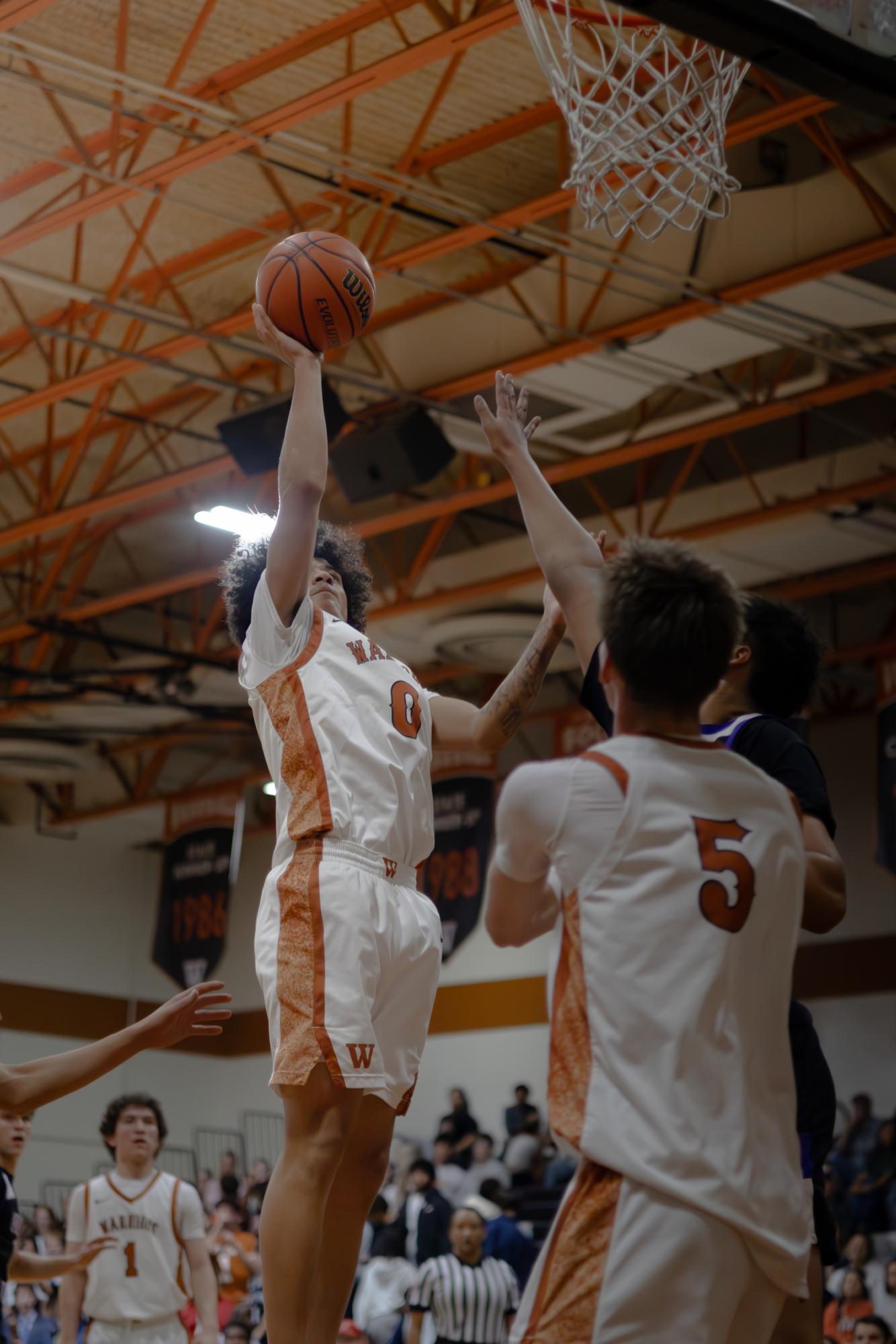 Varsity Boys Basketball Swoop Past the Raiders Winning 67-46