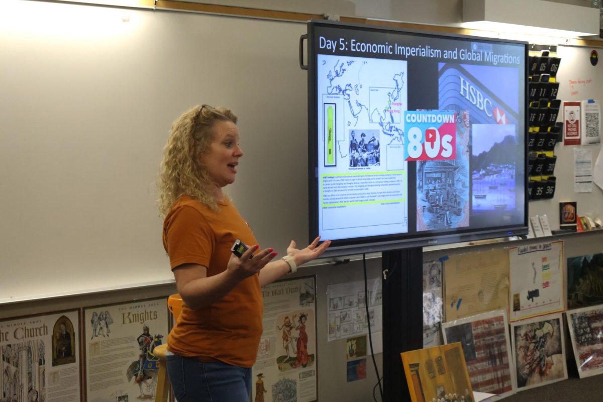 Talking animatedly, Advanced Placement (AP) World History teacher Misty Matthews guides students through the lesson. Ms. Matthews has been a key component to the Westwood history department, getting to grow alongside the student body. “I first started [teaching] at Westwood around 2010 and kids would've all felt a certain way but now it's way different," Ms. Matthews said. “Sometimes it's divided and it's interesting how things have changed. But I have to do my best to teach facts."
