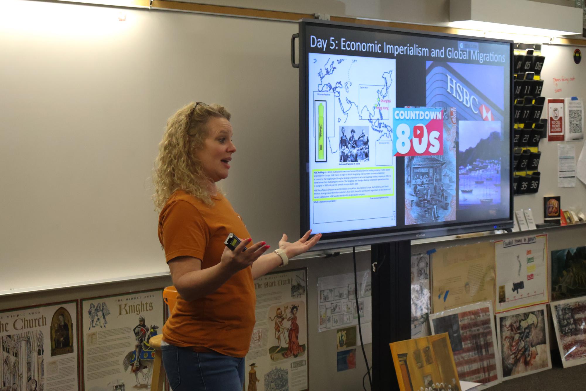 Talking animatedly, Advanced Placement (AP) World History teacher Misty Matthews guides students through the lesson. Ms. Matthews has been a key component to the Westwood history department, getting to grow alongside the student body. “I first started [teaching] at Westwood around 2010 and kids would've all felt a certain way but now it's way different," Ms. Matthews said. “Sometimes it's divided and it's interesting how things have changed. But I have to do my best to teach facts."