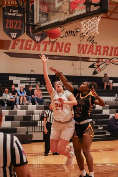 Stretched thin, reaching up to take a layup under pressure, Lola Proano Valentina '26 dodges around her defender to secure the Warriors another solid two points. The Warriors remind successful in their layup attempts throughout the entirety of their game. 