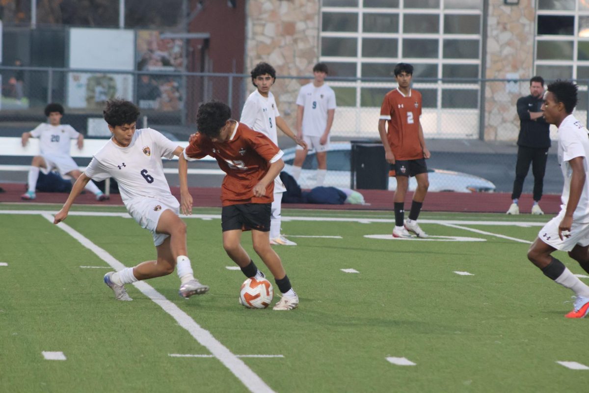 Keeping possession, Diego Garcia ‘29 tries to move back to get more space as Tiger defenders try to intercept the ball. His effort helped disrupt the Stony Point’s attacks, helping the Warriors keep the ball for the majority of the game.