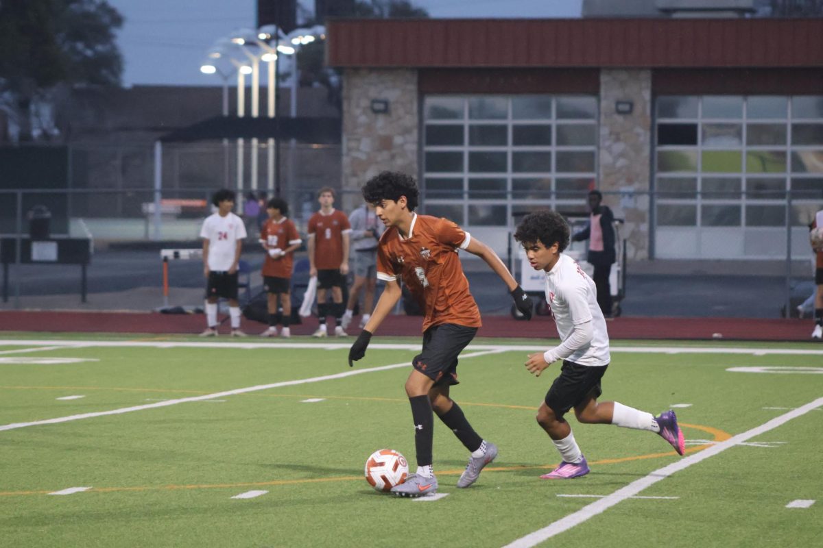Pushing the ball forward, Dhruv Pandare '27 directs the ball away from the Warrior goal, helping start another Warrior attack on the Raiders. He was important in intercepting the Raider attacks and moving the ball forward.