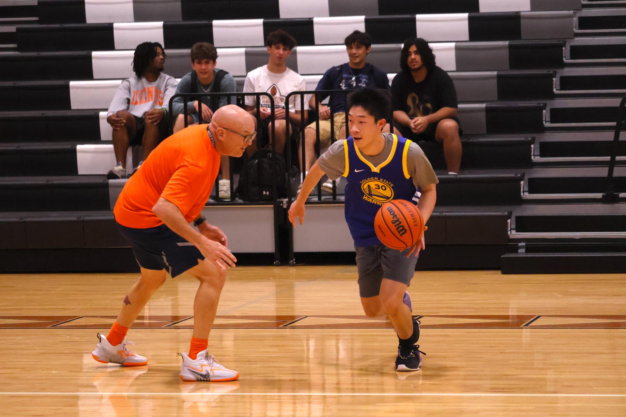 Staff Takes Victory in Annual Student Versus Staff Basketball Game