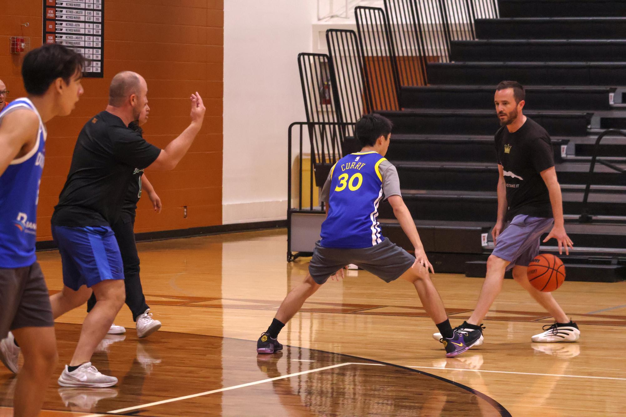 Staff Takes Victory in Annual Student Versus Staff Basketball Game