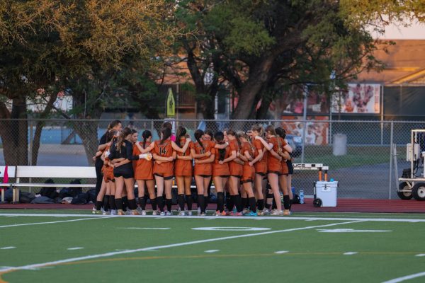 Cheering loudly, the Girls' varsity soccer team chants loudly in their routine pregame circle.  The Warrior's game against Vista Ridge was also "Senior Night", an event where teammates and families in the stands took time to commemorate the Seniors on the team. “Overall we had amazing passing during this game, we had the majority of possession no doubt, and senior night was incredible,” Savoie said. “I couldn't have asked for anything better, 16 people came to support me (parents, sister, grandparents, boyfriend, family friends, and friends), we won 3-0 and overall it meant so much.”