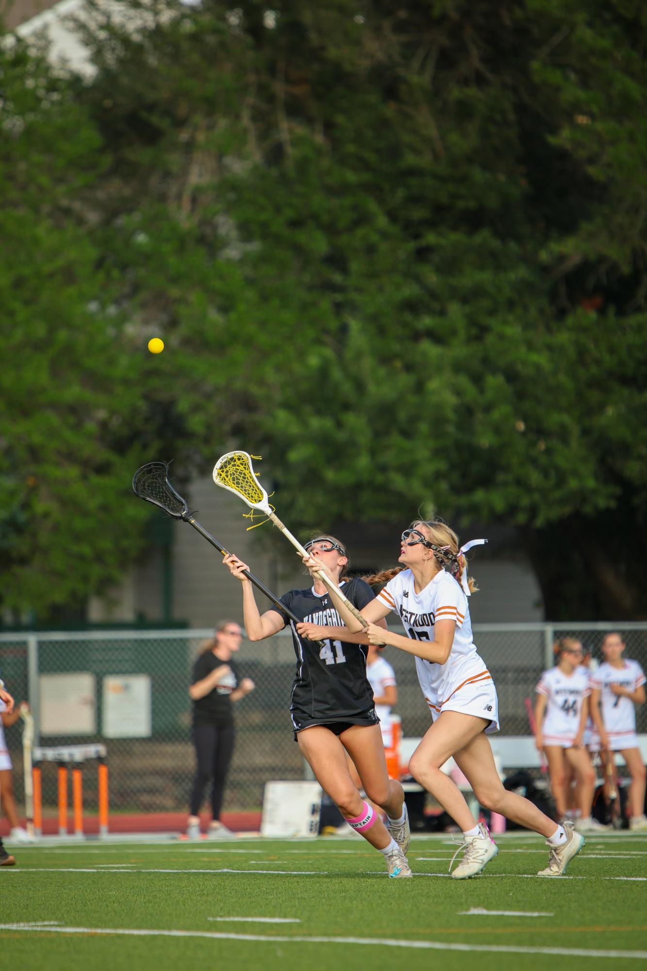 Varsity Girls' Lacrosse Shine Bright in 13-7 Win on Senior Night