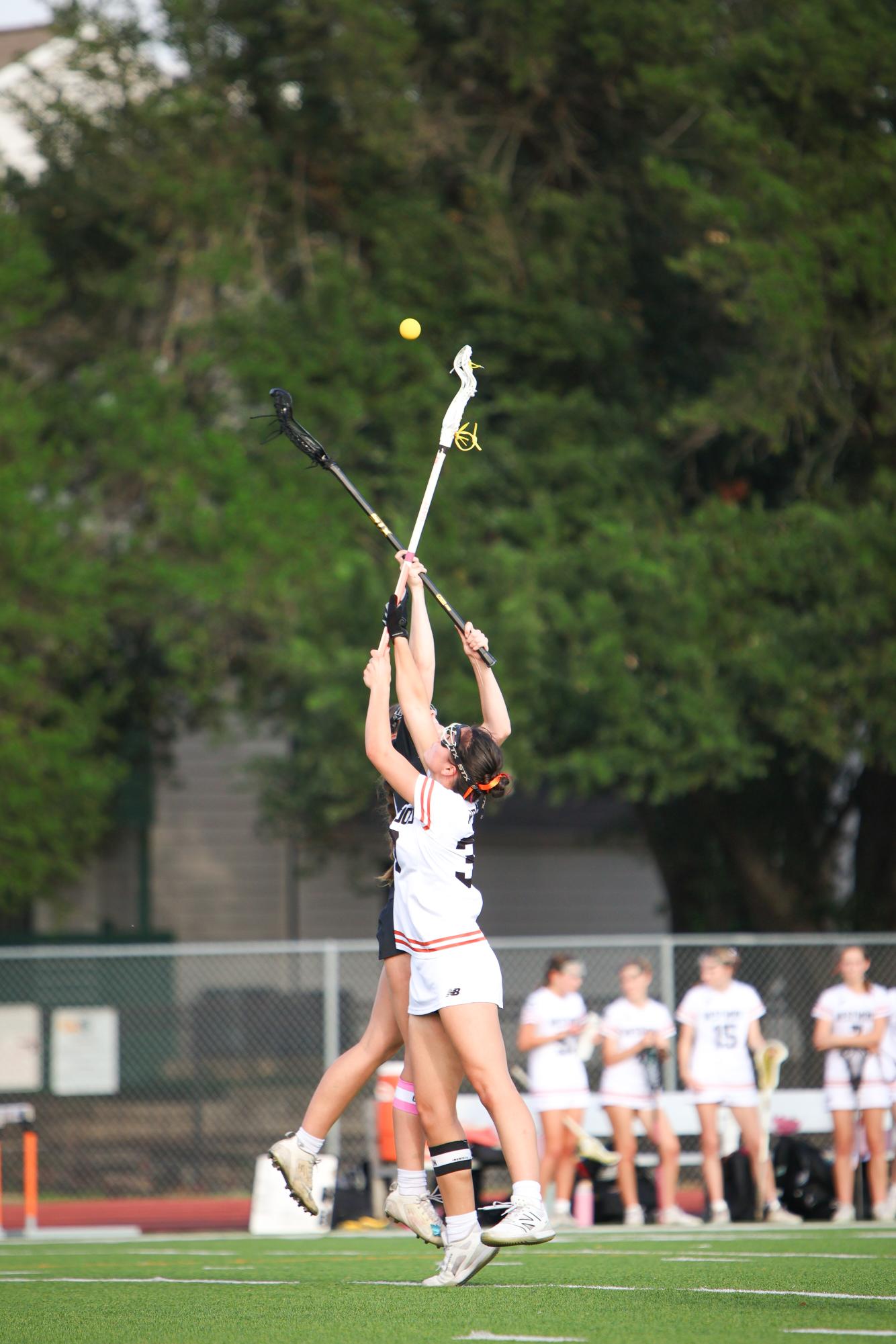 Varsity Girls' Lacrosse Shine Bright in 13-7 Win on Senior Night