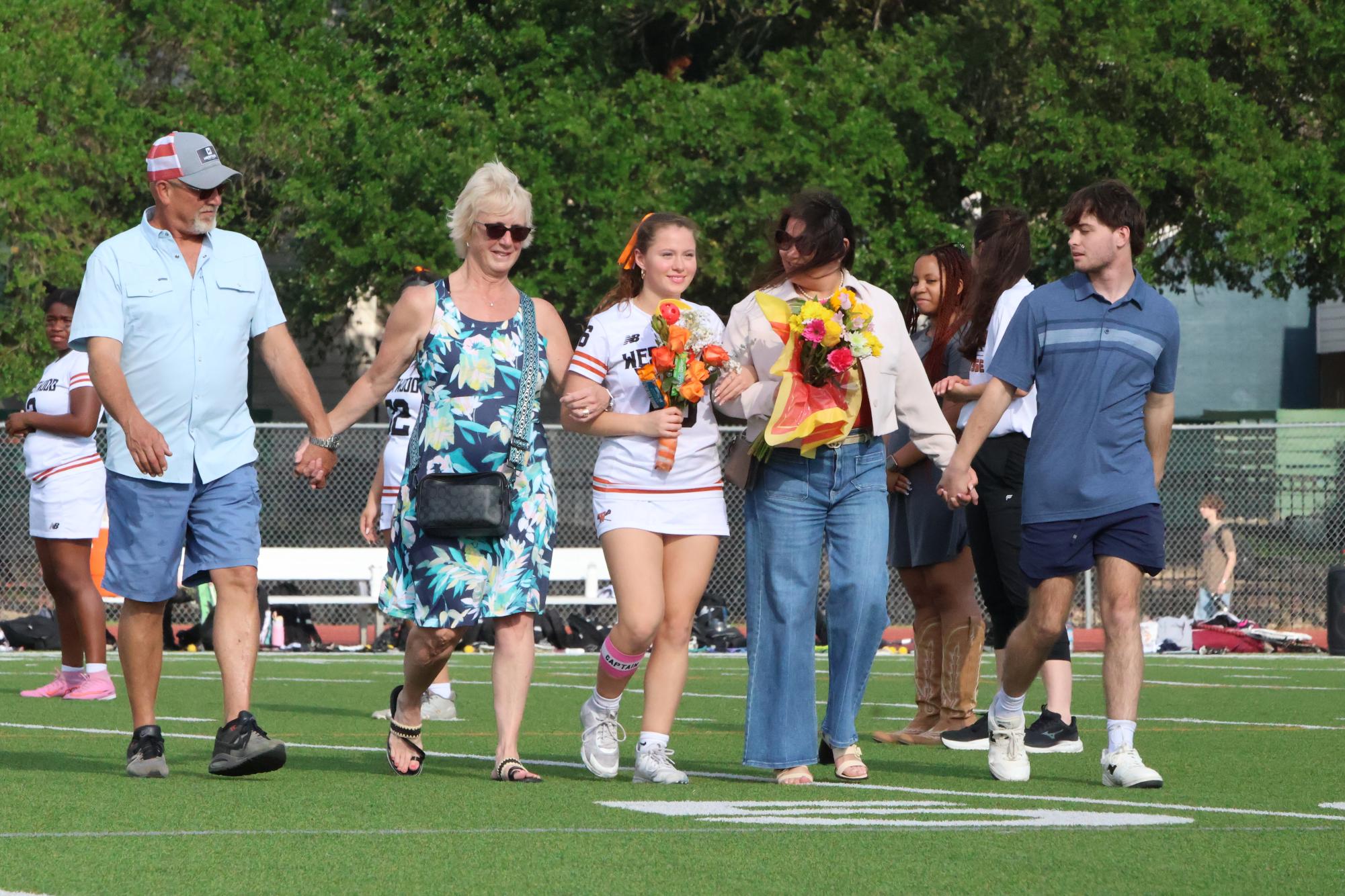Varsity Girls' Lacrosse Shine Bright in 13-7 Win on Senior Night