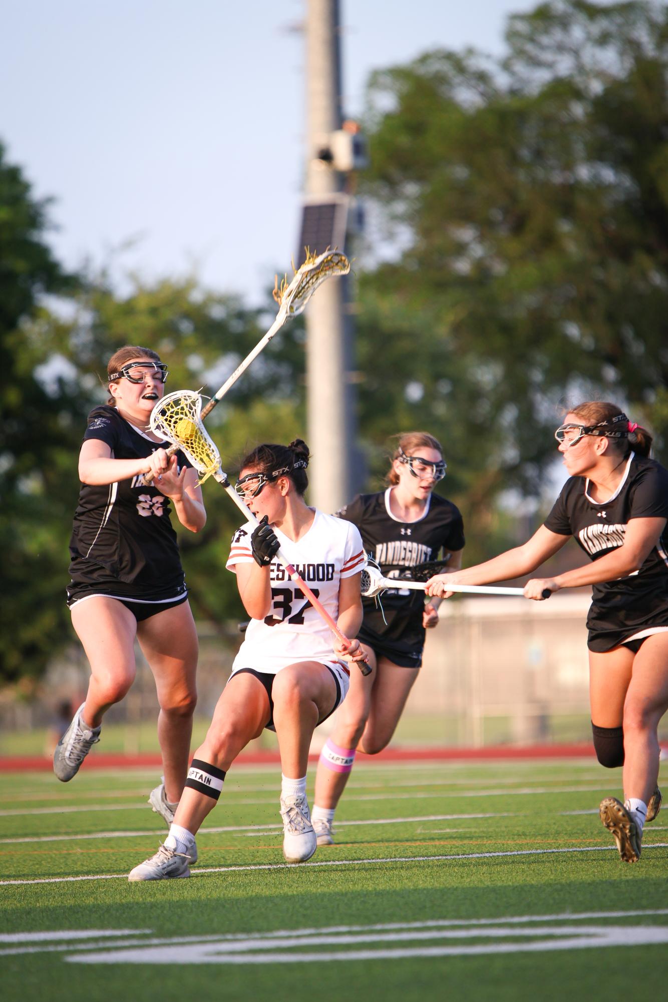 Varsity Girls' Lacrosse Shine Bright in 13-7 Win on Senior Night