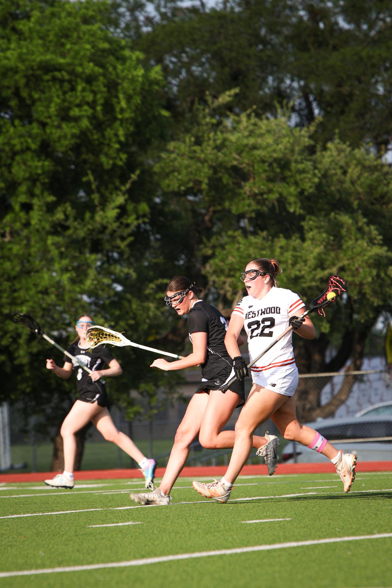 Varsity Girls' Lacrosse Shine Bright in 13-7 Win on Senior Night